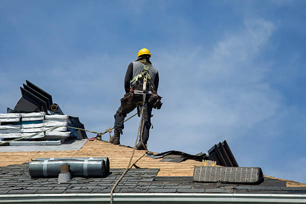 Professional Storm Damage Roof Repair technician working in East Dennis, MA